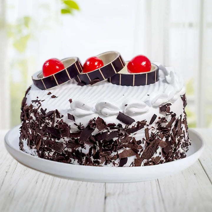 Black Forest Cake with Cream and Cherry.