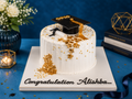 Golden blossom white graduation cake